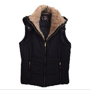 Black vest with faux fur trim and hood